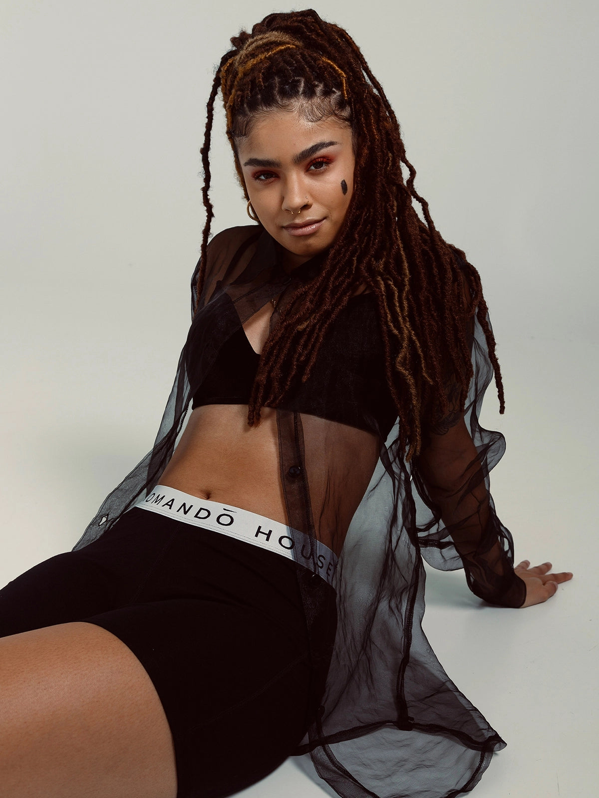 BLACK Woman wearing helena foxerz by la maison komando 